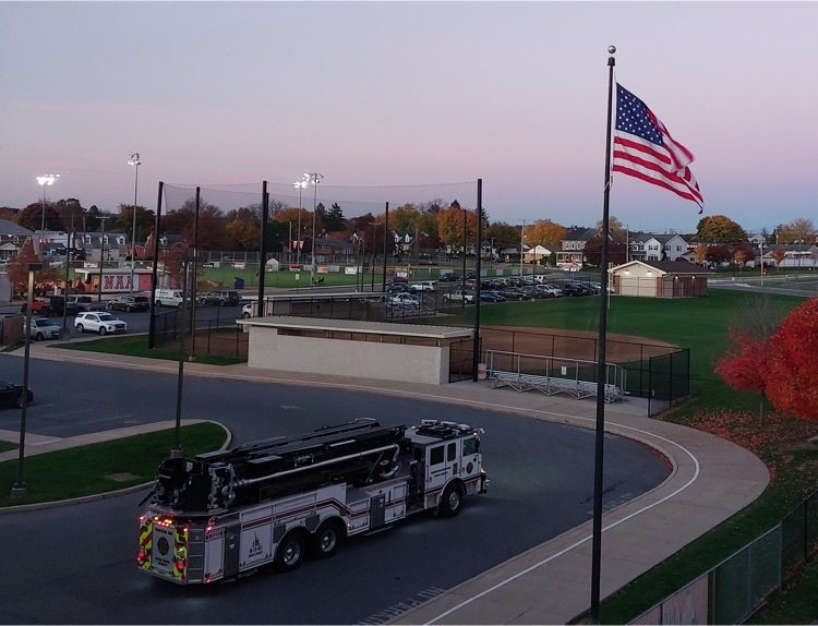 flag pole with fire truck